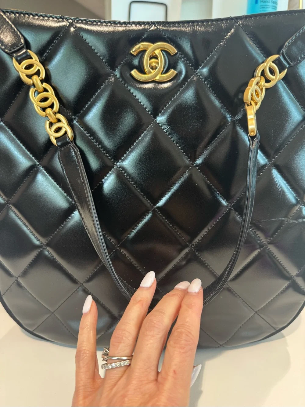 CHANEL Black Quilted Lambskin Shoulder Bag with Gold CC Accent